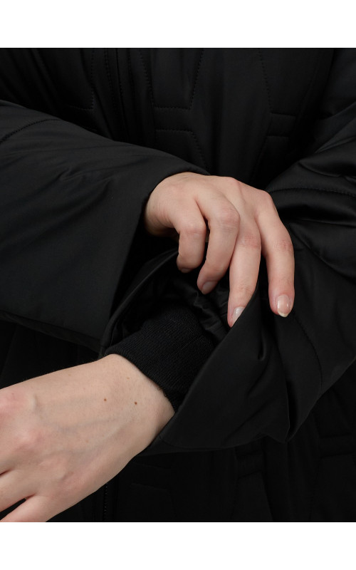 Длинный зимний пуховик для женщин больших размеров.