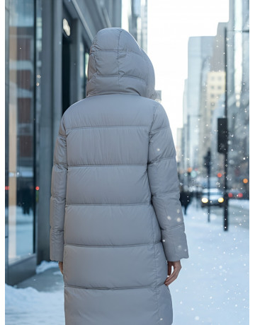 Длинный женский пуховик с капюшоном для зимы.