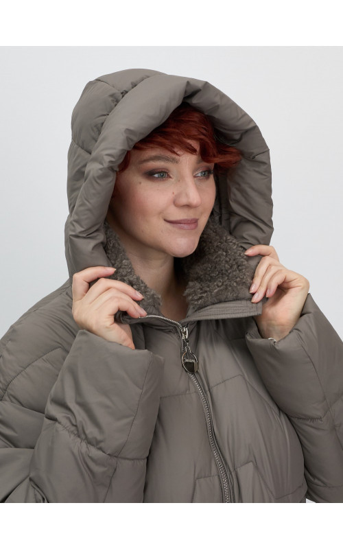 Пуховик для женщин с искусственной овчиной: стиль и тепло зимой