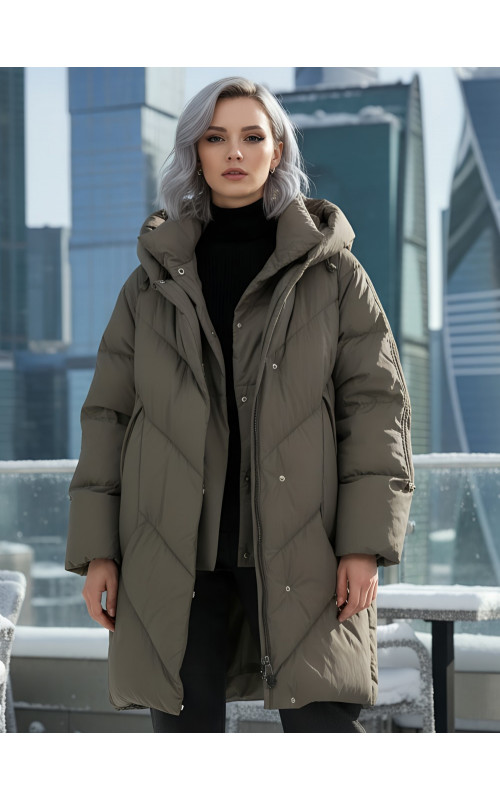 Длинный женский пуховик для зимы.