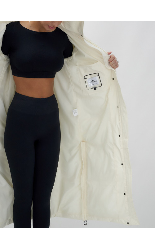 Длинный зимний пуховик с капюшоном для женщин.